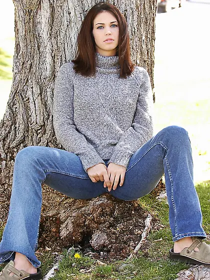 Cute and sexy solo brunette babe,  Faith Leon shows her tits and