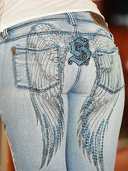 Misty Anderson with nicely shaped tits and butt takes off her je