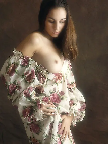 Stunning gal with gorgeous breasts displaying everything in high