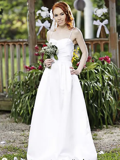 Pretty red-haired bride discards wedding dress to flaunt her sex