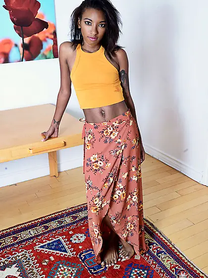 Playful Ebony girl with tiny titties shoves her sex hole spreadi