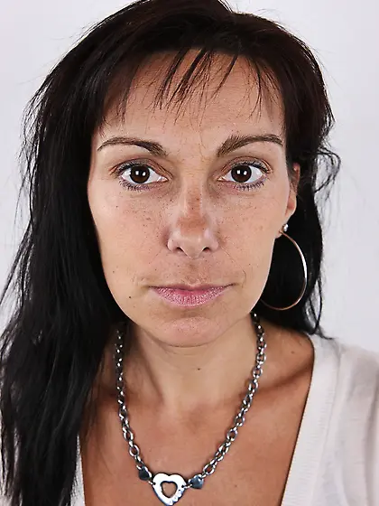 Black haired lady strips