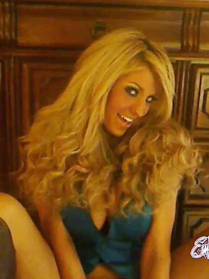 Foxy blonde babe Ember Reigns strips her clothes and shows her p