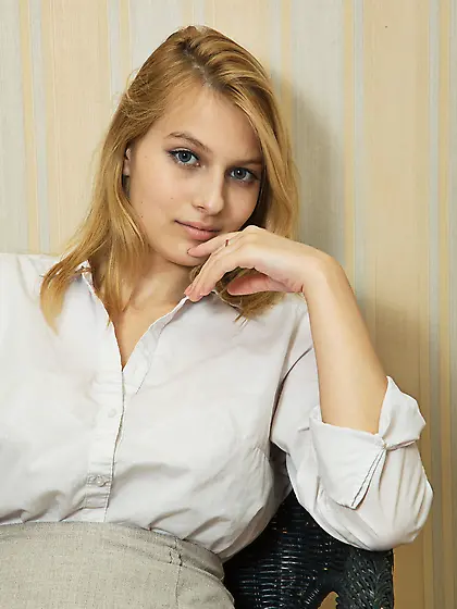 Blonde and busty Cielle Lesage strips to show her tits and pussy