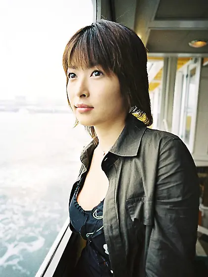 Asian darling Nana Natsume needs to pose in front of the camera