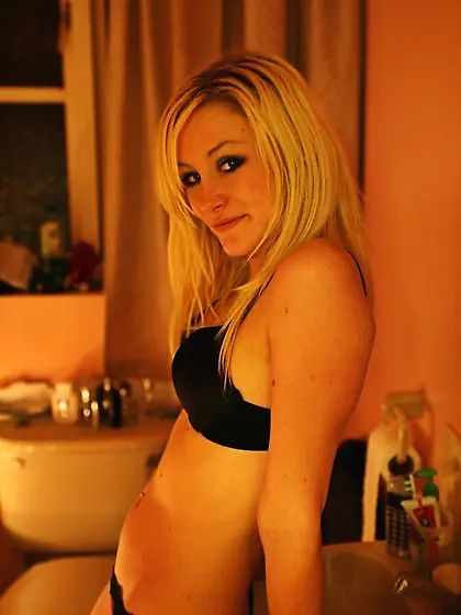 Amazing beautiful blonde undresses