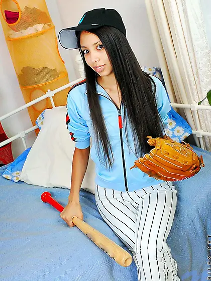 Baseball-loving chick Alexis Love taking her sport unifrom off a