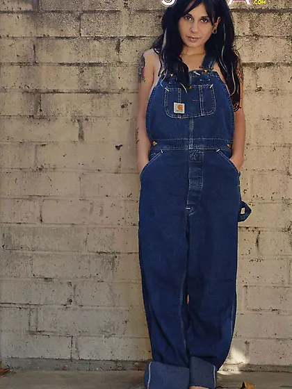 Punk babe Joanna Angel reveals her boobs before stripping