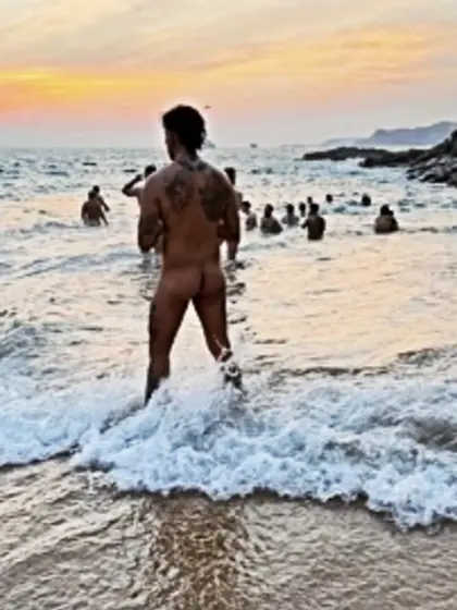 Men nude at the beach