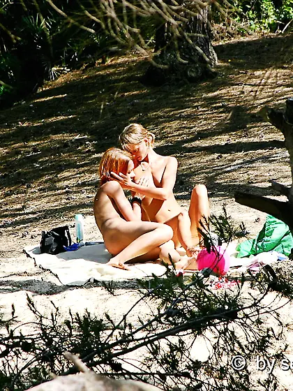 Girls lesbian games on the beach in Mallorca
