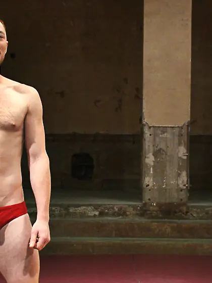 Nude male wrestlers battle