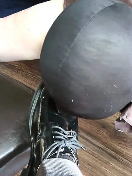Slave licks shoes clean