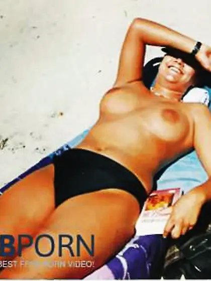Teenager with phat bra-stuffers on the beach