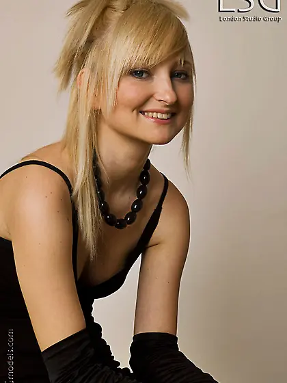 fair haired kitty Diamond Nubiles in black stockings exposes her