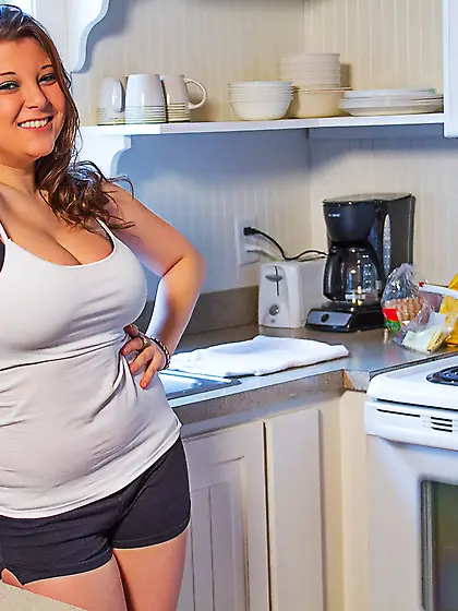 Two chesty redheads shakes their asses and playfully eat banana