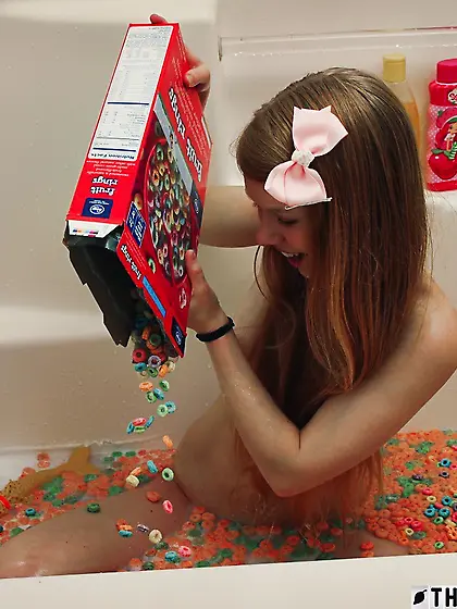 Silly teen doll is being cute and naughty while taking a bath