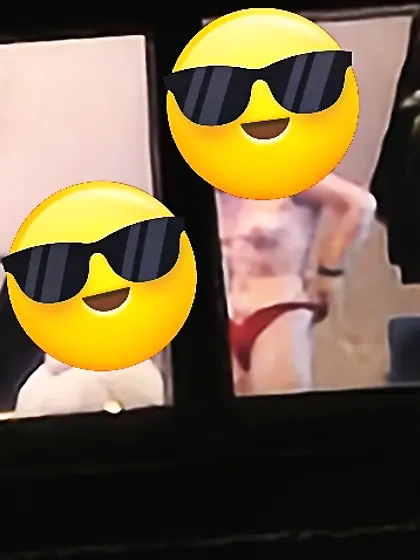 Old window peep pics---gal in her thongs