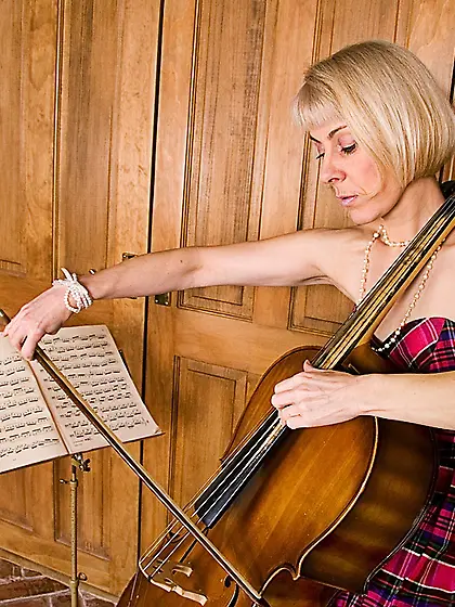 Bushy milf Hazel May in stockings and shoes takes off her dress