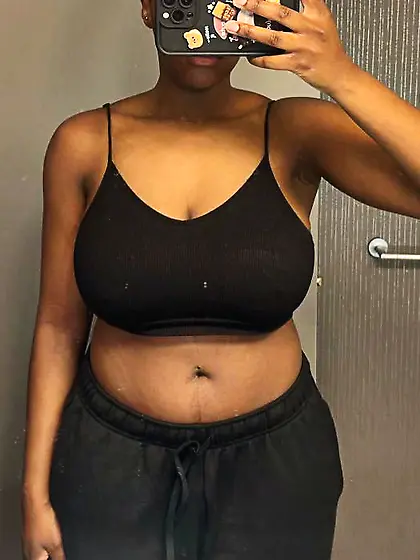 20yr old ebony coed flashing 34ddd in a tank top