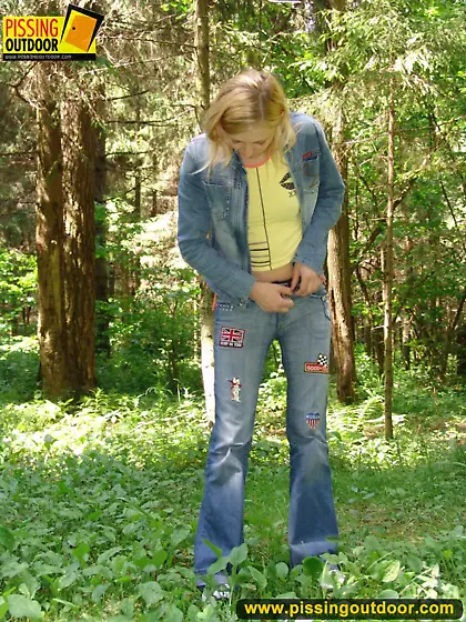 Pissing outdoor in the green forest