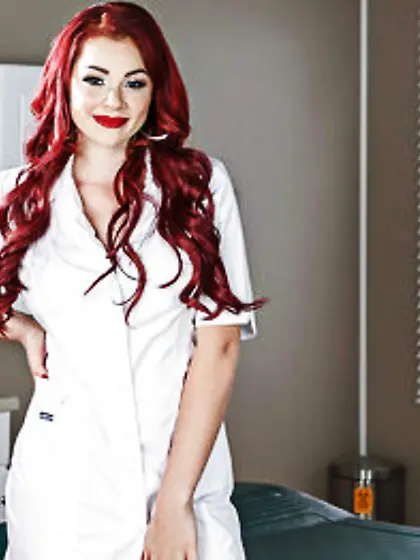 Redhead in stockings and shoes has sweet jugs to show removing r