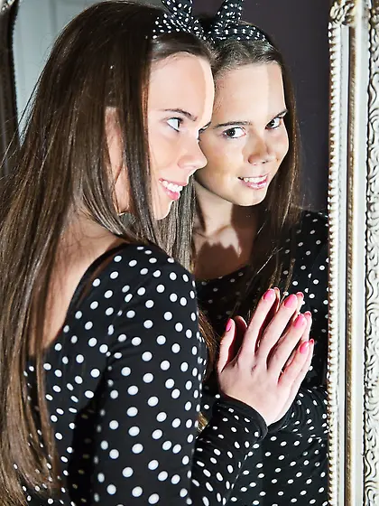 Tiny teen cutie with long hair undressing in erotic solo scene o