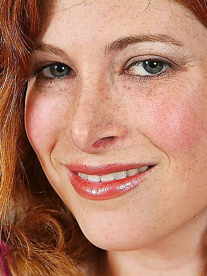 Big titty redhead milf Ginger Blaze strips out of her lingerie a