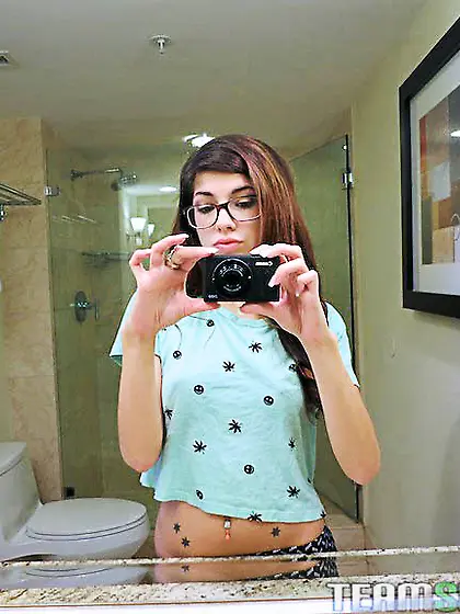 Pierced tattooed brown-eyed brunette