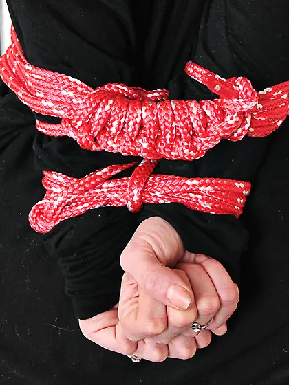 Sexy redhead bound stool