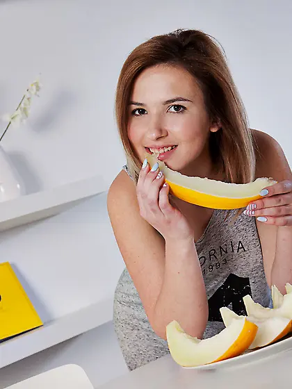 Melon lover teen rubbing herself and showing that pussy on a tab