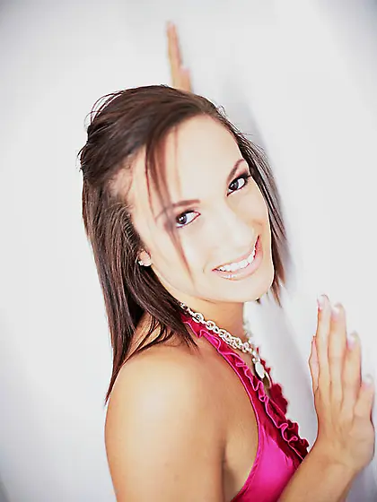 Filthy doll Janell Allure shows mouth filled with cum after the