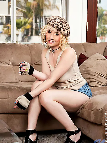 Cute blonde teen Proxy Paige strips her denim skirt and shows he