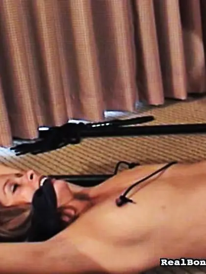 Vibrator stimulates juicy pussy of bondaged...