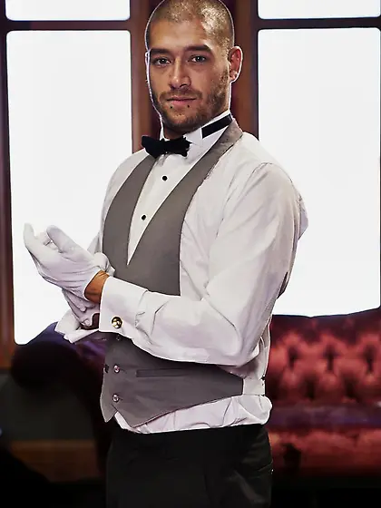 Dark-haired maid caned face