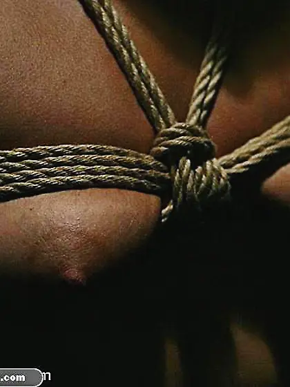 Blonde chick in bondage sucks a dildo with...