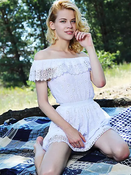 Wild hair blonde takes off her white dress to expose that slit o