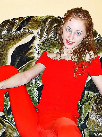 Redheaded teen striptease