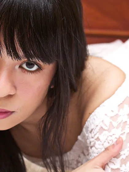 Filipina model Justine Molina nude on bed