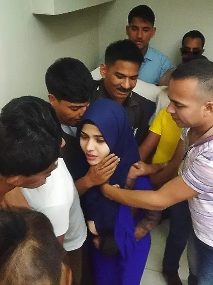 Hijabi girl in Male prison