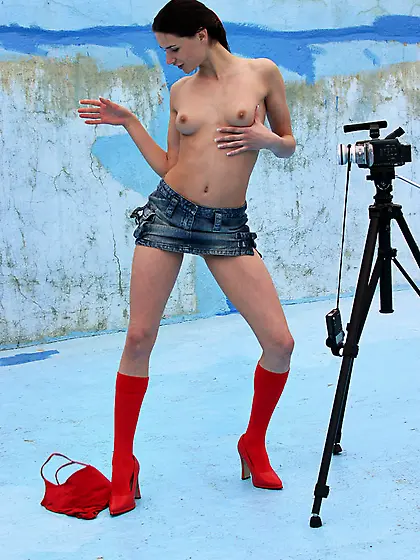 Katya Nubiles strips her denim shorts in front of the camera and