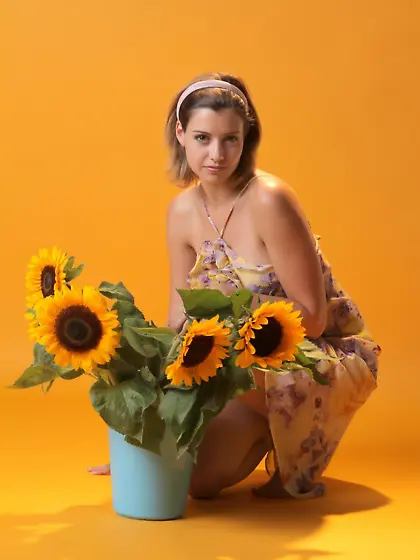 Wonderful blonde babe Vienna is getting nude and hotly posing wi