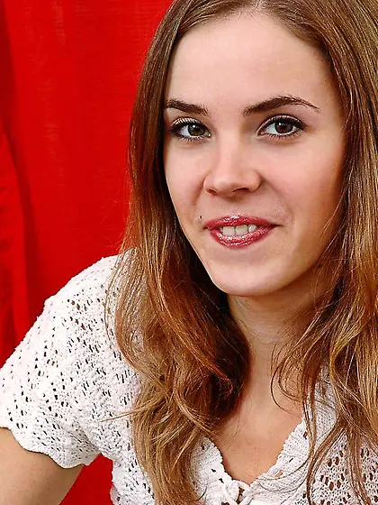 Skinny teen Emanuelle Nubiles with tiny tits strips and pets her