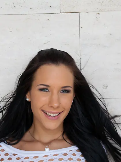 Big booty brunette in a mesh top slowly stripping outdoors and m