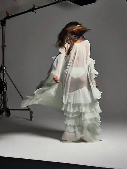 Zoe Saldaña in sheer white outfit