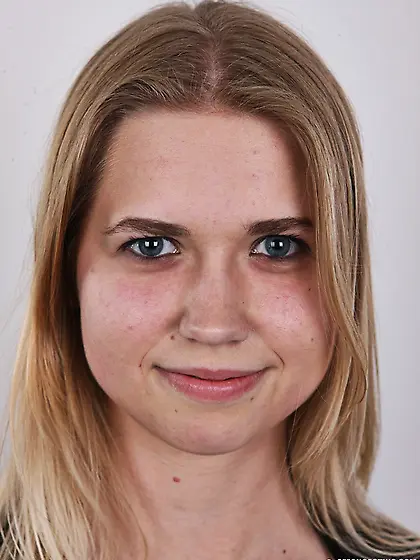 Young pretty blonde strips