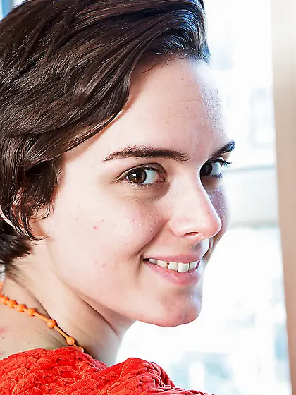 Female takes her dress and green lingerie off dancing with headp