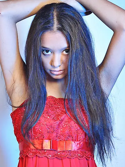 Oily Asian is perfect and she poses in the most seductive way to