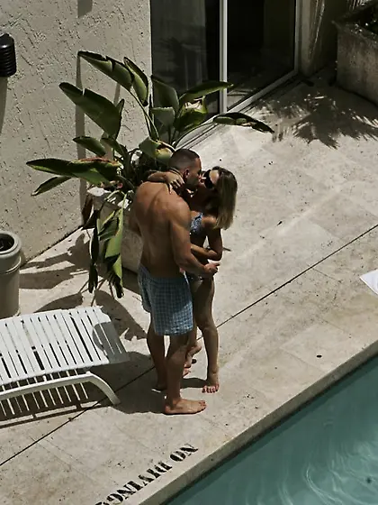 Sophia Lynn takes her black lingerie off on the bed and swallows