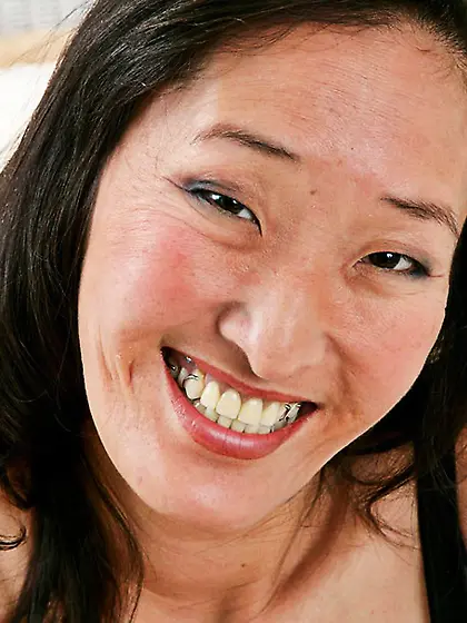 Tattooed asian black reveals