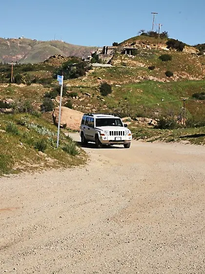 Shay Golden takes her clothes off on the bed and gets her fanny